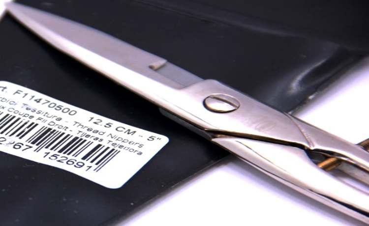 قیچی جا دکمه