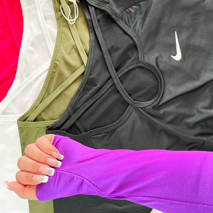 خرید اینترنتی کراپ تاپ ورزشی آستین دار فینگر دار نایکی Nike