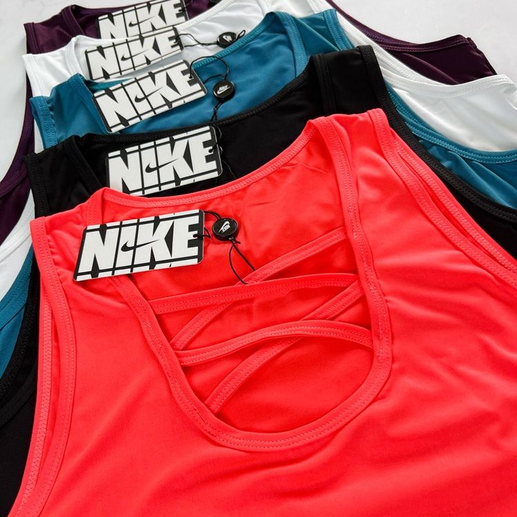 خرید اینترنتی تاپ ورزشی هارنس دار نایکی Nike