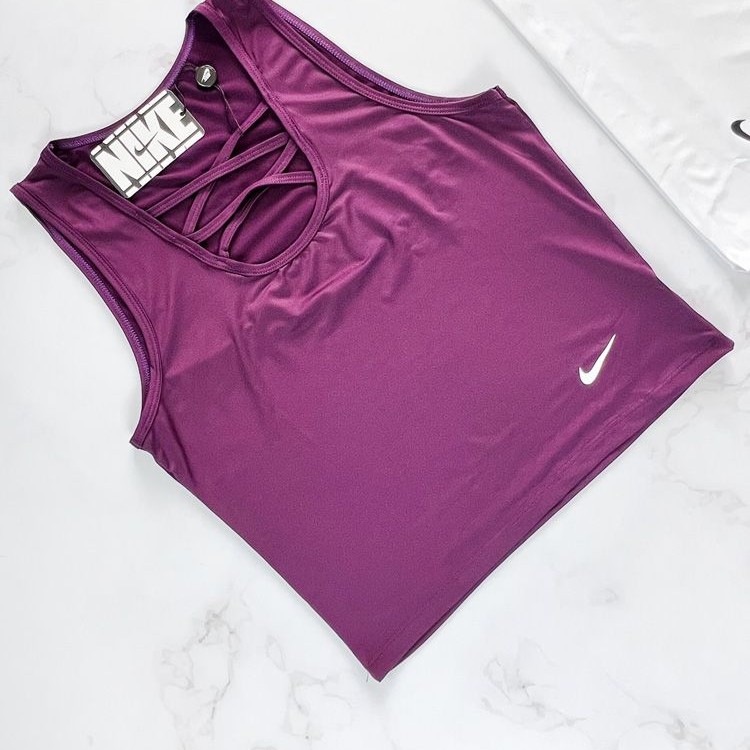 خرید اینترنتی تاپ ورزشی هارنس دار نایکی Nike